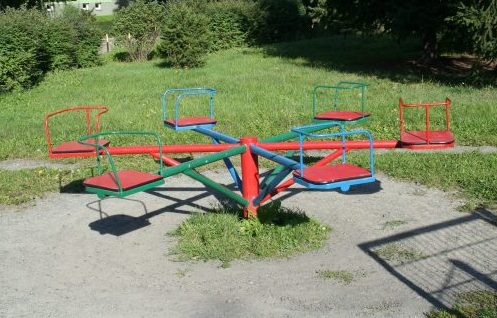 a carousel with a worn path without safe surfaces.